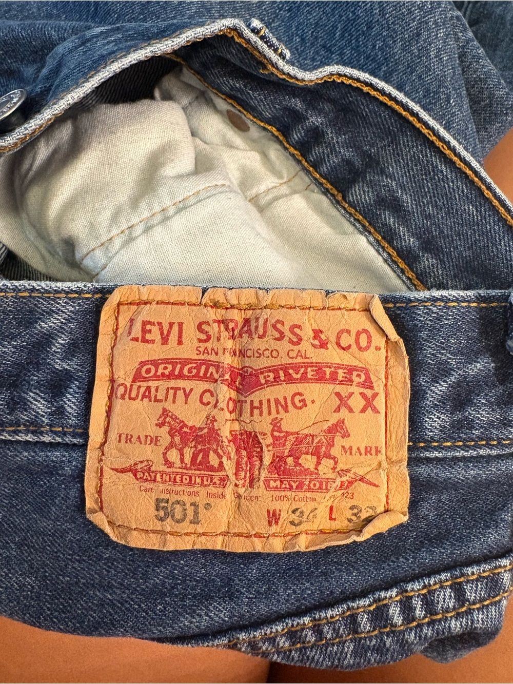 Levi's Men's Straight Dark Blue Denim Jeans with Tan Patch